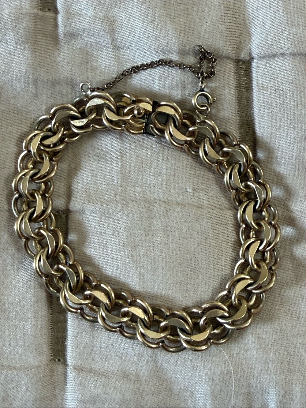 Vintage MCM 12k gold-filled double-row wheat link bracelet with safety chain.